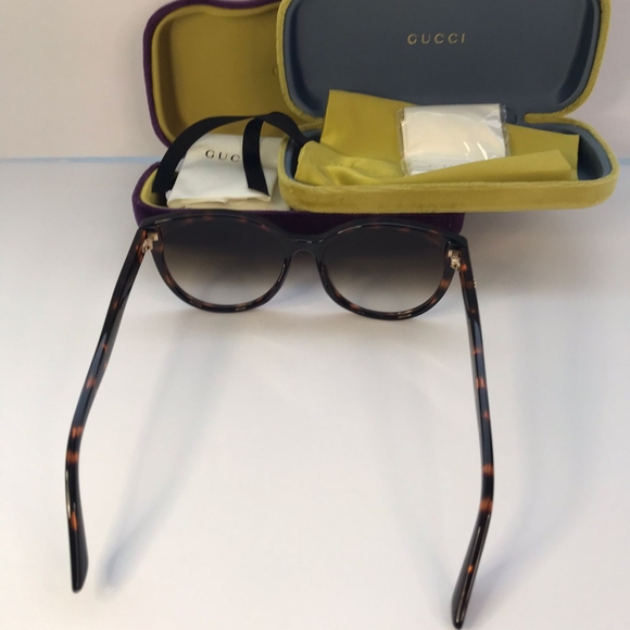 Auth - GUCCI GG0636SK 002 round Gucci sunglass comes in a dark havana frame with main image 8